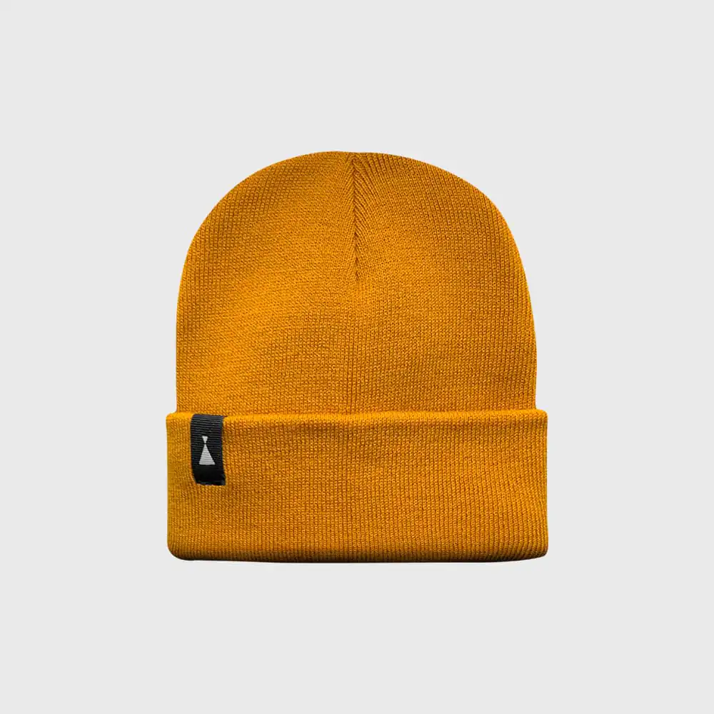 Gorro mostaza de lana para mujer y hombre, estilo casual y cómodo.